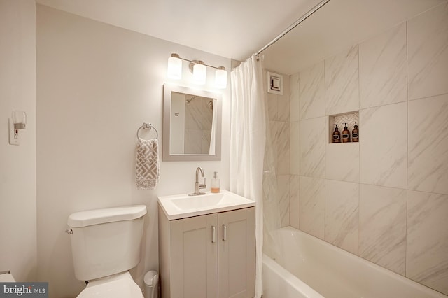 full bathroom with vanity, toilet, and shower / bath combo