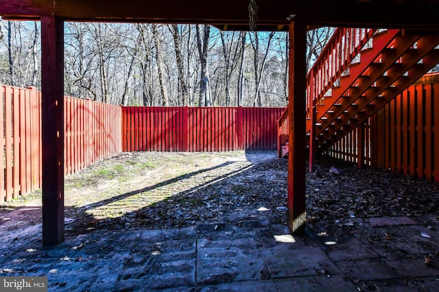 view of yard with a fenced backyard