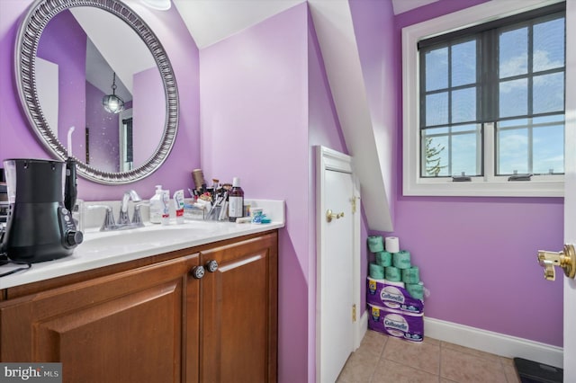 bathroom with vanity and tile patterned flooring