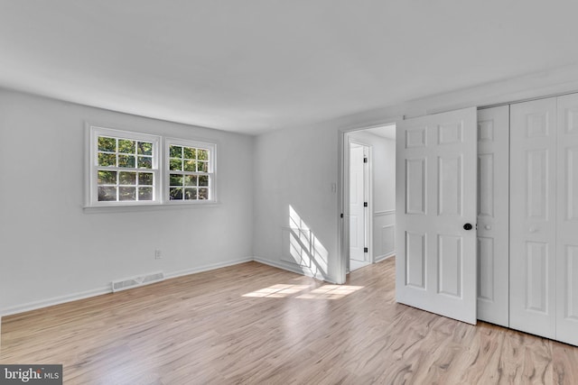 empty room featuring light wood-type flooring