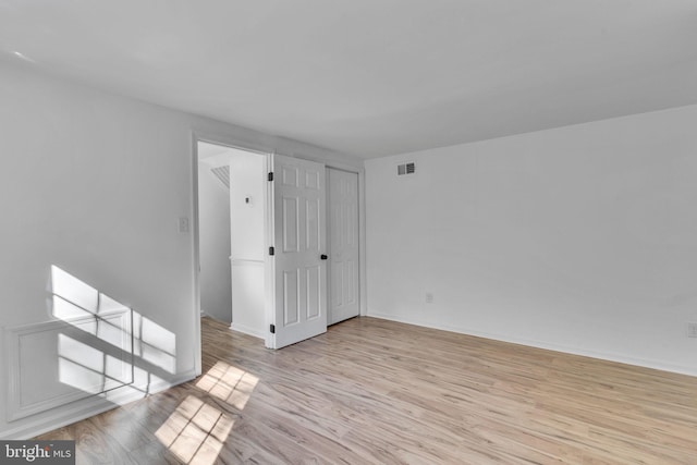 empty room featuring light hardwood / wood-style flooring