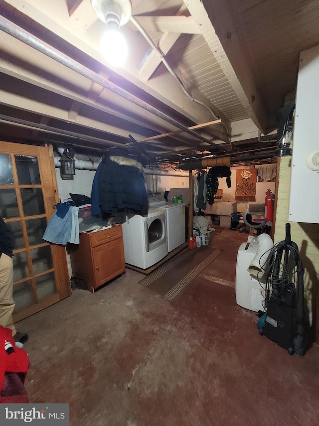 basement featuring washer and dryer