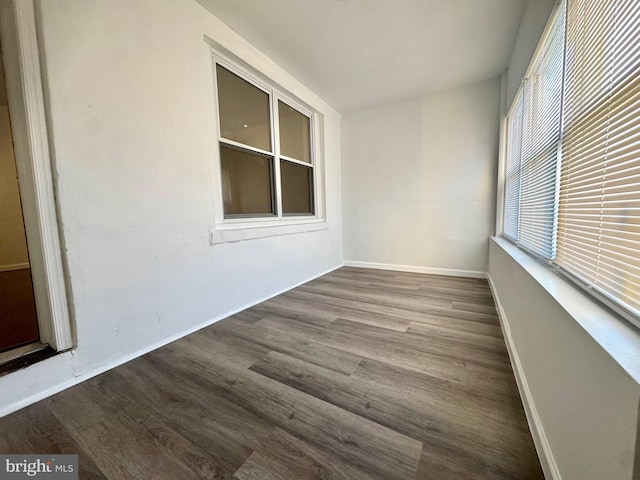 unfurnished sunroom featuring plenty of natural light