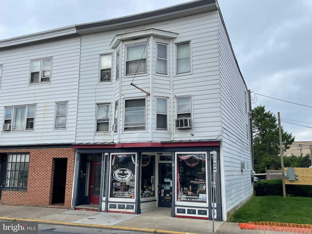 view of front of home featuring cooling unit