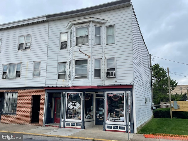 view of front of home featuring cooling unit