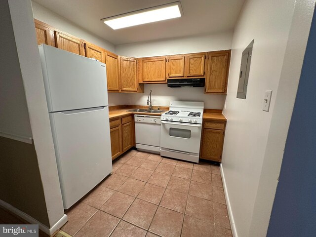 kitchen featuring sink, electric panel, light tile patterned flooring, white appliances, and ventilation hood