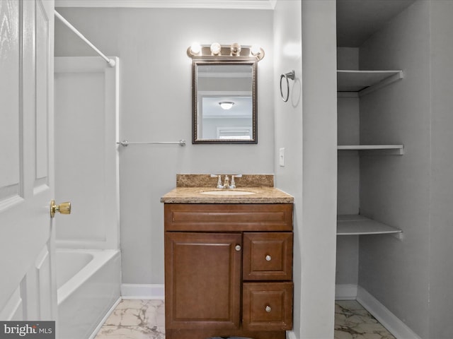 bathroom featuring shower / washtub combination and vanity