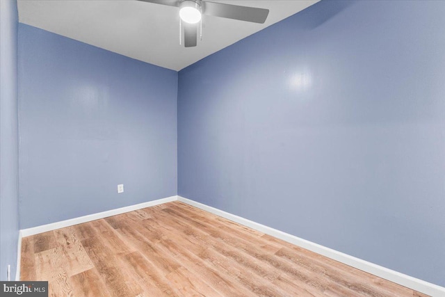 empty room featuring ceiling fan and light wood-type flooring