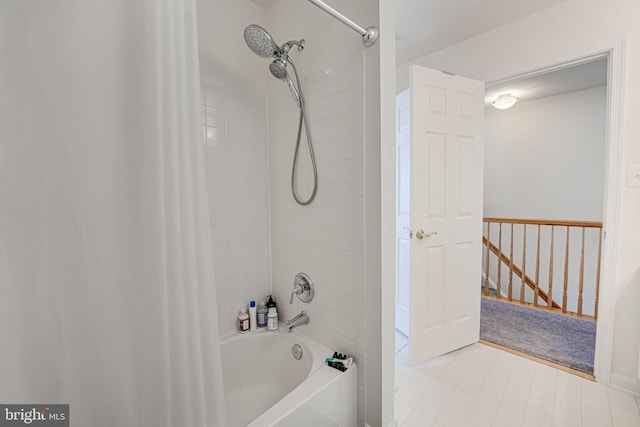 bathroom featuring tiled shower / bath combo