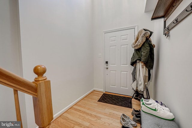 entrance foyer with hardwood / wood-style floors