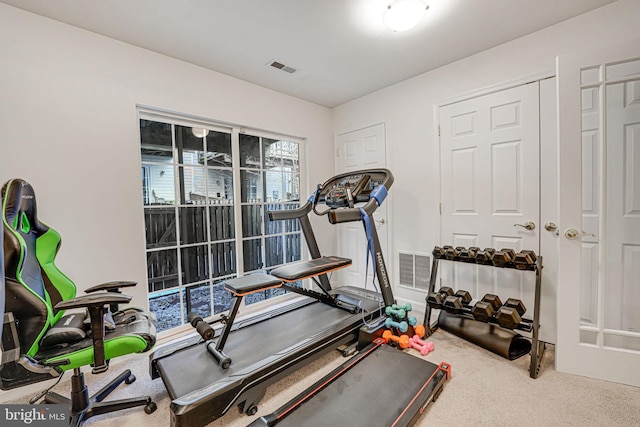 exercise room with carpet floors