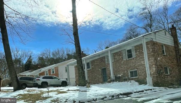 view of snow covered property