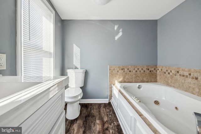 bathroom with toilet, wood-type flooring, and a washtub