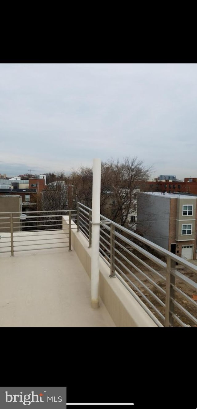 view of patio with a balcony