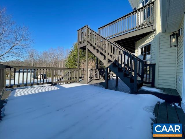 view of snow covered deck