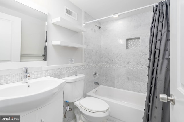 full bathroom featuring tile walls, tasteful backsplash, toilet, shower / bath combo with shower curtain, and vanity