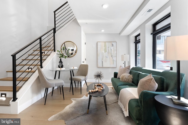 living room with light hardwood / wood-style floors