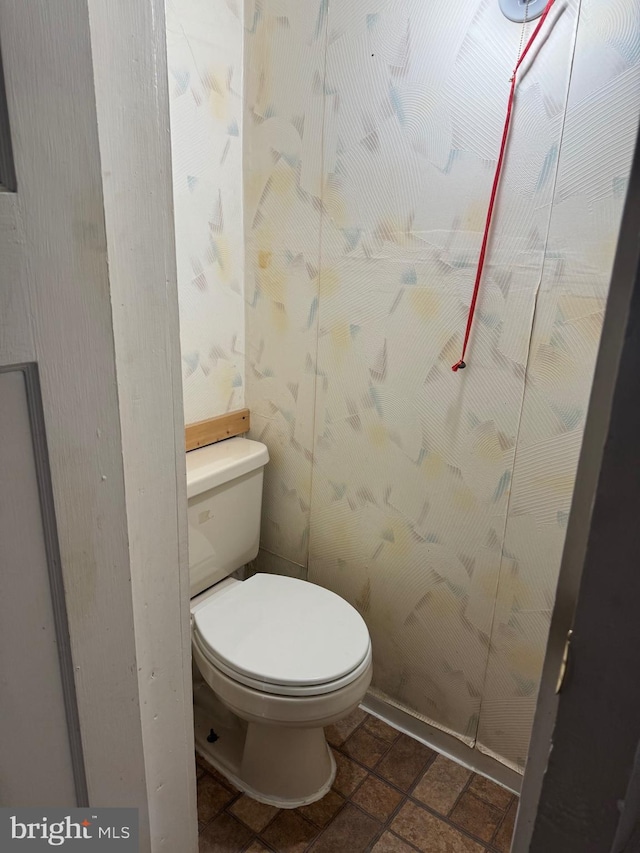 bathroom featuring toilet