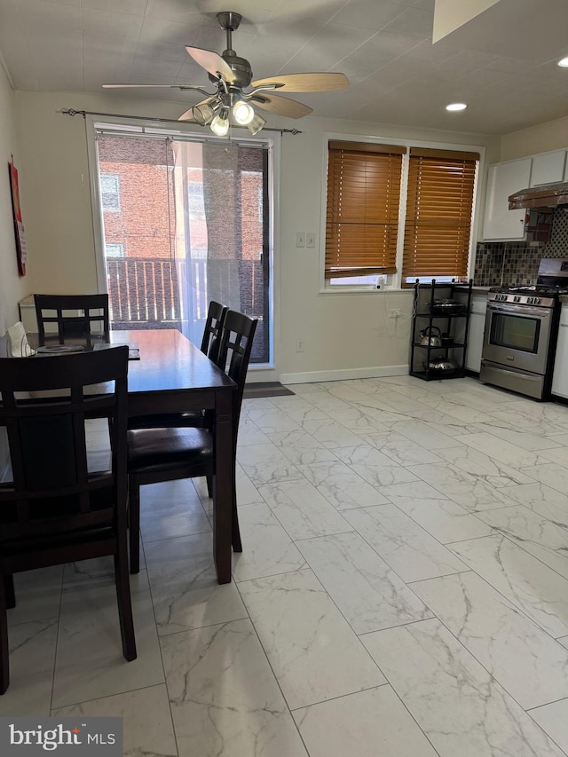 dining area featuring ceiling fan