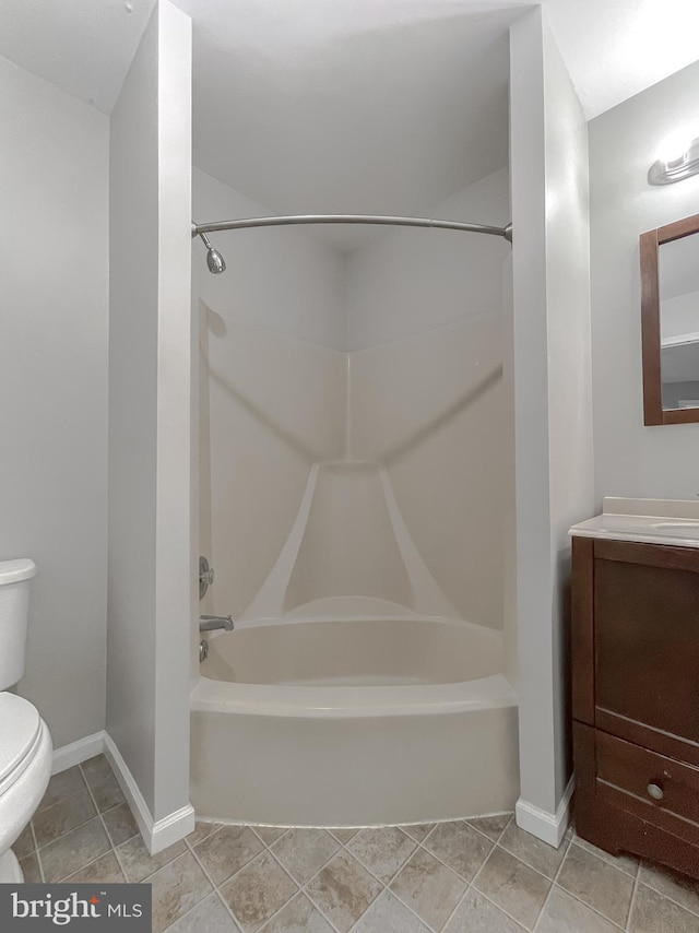 full bathroom featuring toilet, vanity, and shower / bathtub combination