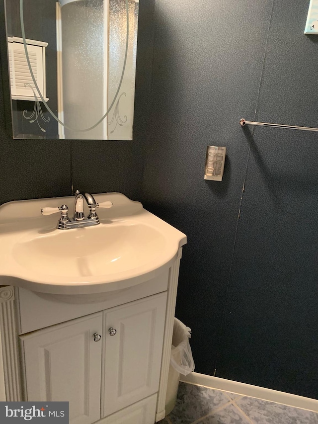 bathroom featuring vanity and tile patterned floors