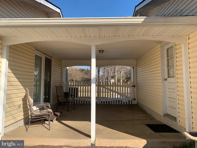 view of patio / terrace featuring a carport