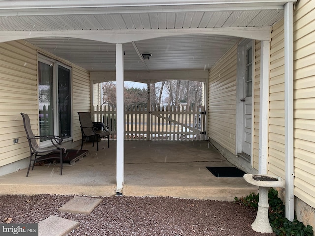 view of patio with a carport