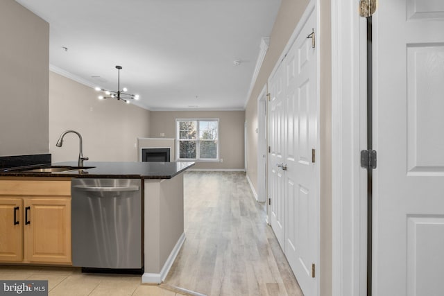 kitchen with sink, an inviting chandelier, stainless steel dishwasher, light brown cabinetry, and crown molding