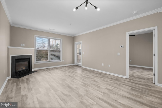 unfurnished living room with ornamental molding, a notable chandelier, and light hardwood / wood-style flooring