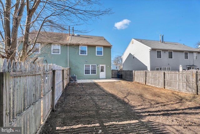 rear view of house with a patio