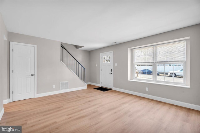 foyer entrance featuring light hardwood / wood-style flooring