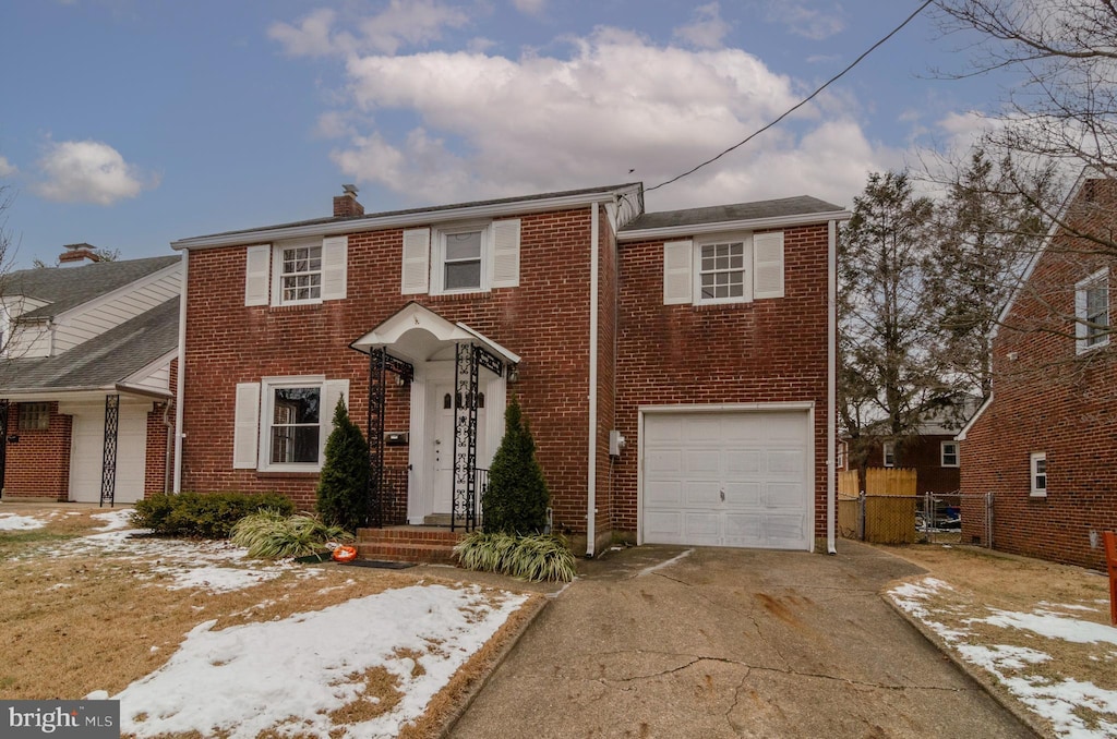 view of front of property with a garage