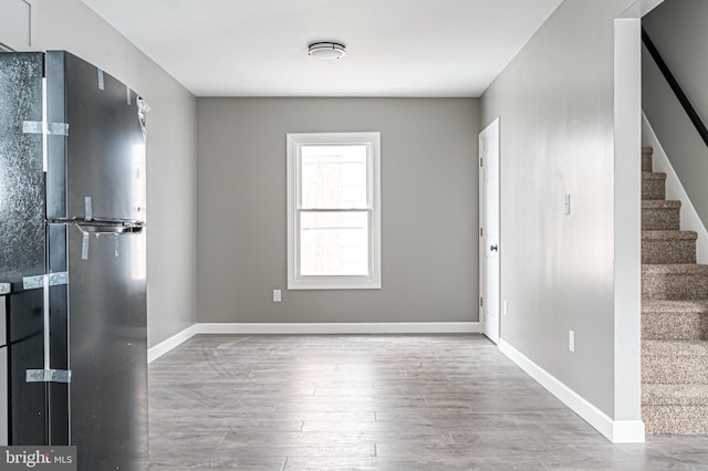 spare room featuring hardwood / wood-style flooring