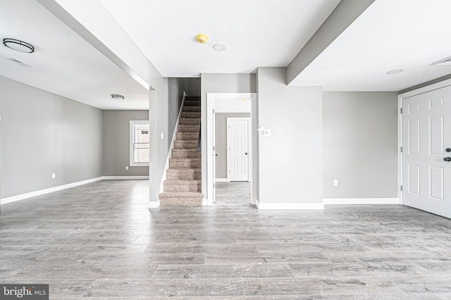 unfurnished living room with light wood-type flooring