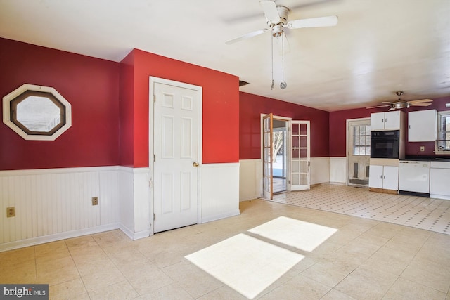 interior space featuring ceiling fan