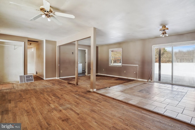 interior space with hardwood / wood-style flooring and ceiling fan