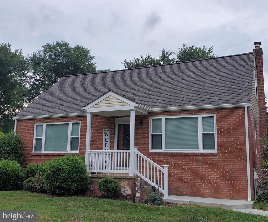 view of front of home with a front yard