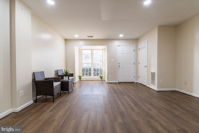 entrance foyer with dark hardwood / wood-style flooring