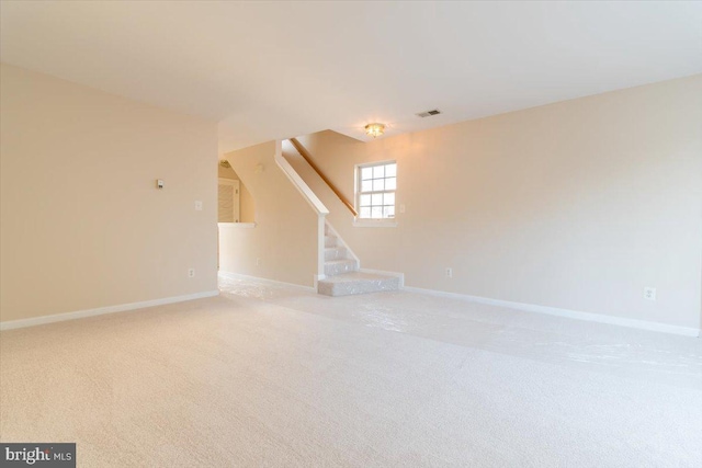 unfurnished living room with carpet