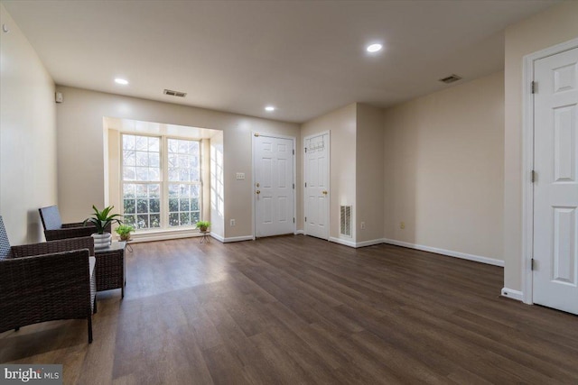 entrance foyer featuring dark wood-type flooring