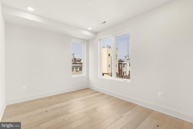 empty room featuring light hardwood / wood-style floors