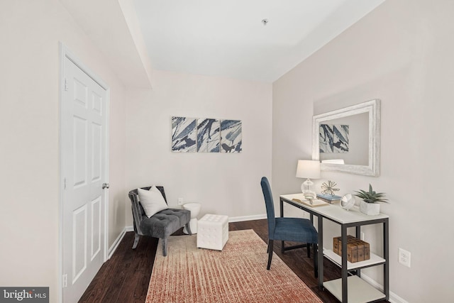 home office with hardwood / wood-style flooring