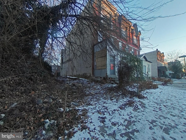 view of snow covered property