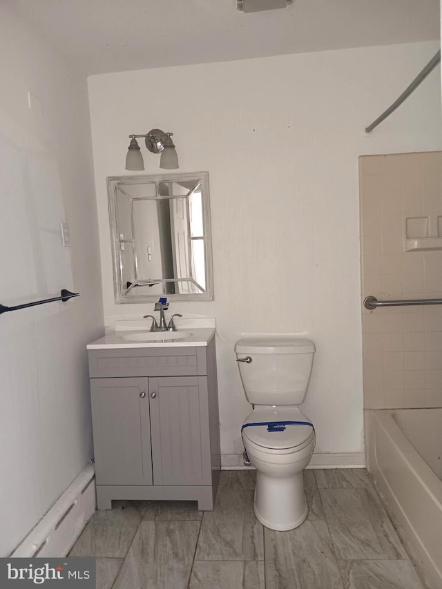 full bathroom featuring toilet, vanity, a baseboard heating unit, and  shower combination