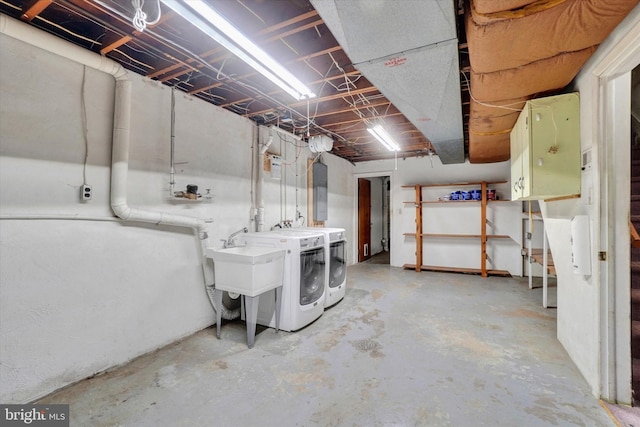 basement with separate washer and dryer