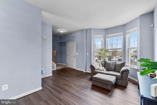 sitting room featuring dark hardwood / wood-style floors