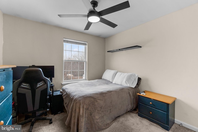 bedroom with light carpet and ceiling fan