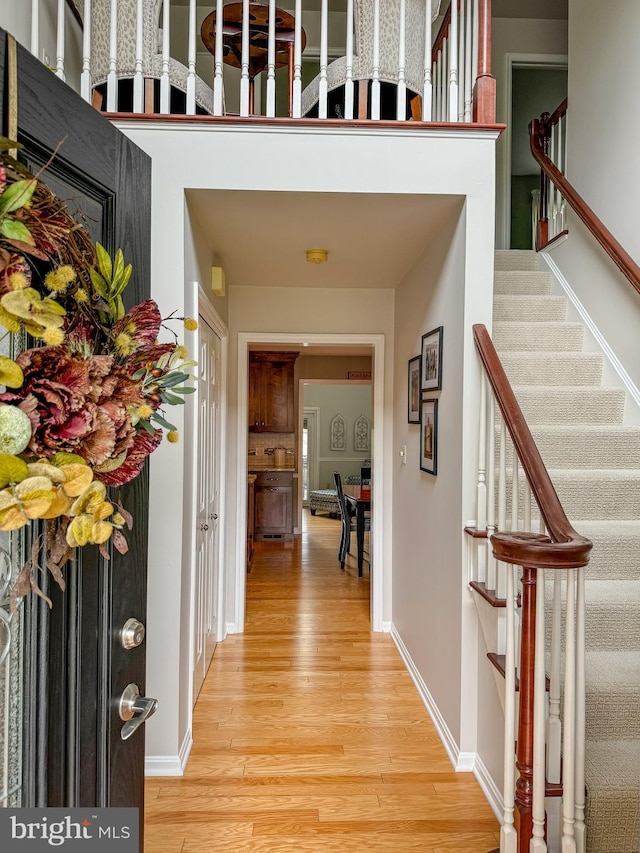 hallway featuring light hardwood / wood-style floors