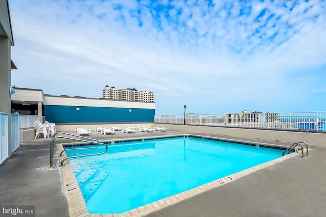 view of pool with a patio