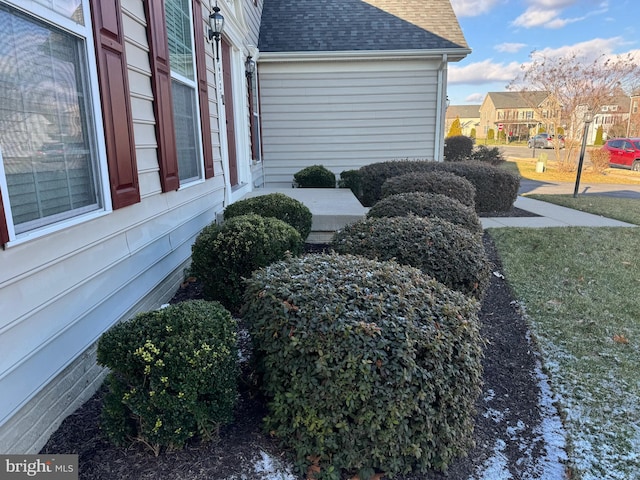 view of property exterior featuring a yard